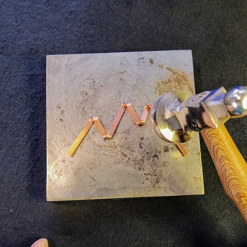 Jennifer Brooks's Alaskan Range Necklace - , Contemporary Wire Jewelry, Making Chain, Chain Making , Loops, Wire Loop, Wrapped Wire Loop, Texturing, , Switch to your hammer & steel block.